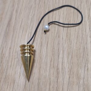 Pendule Témoin doré avec perle